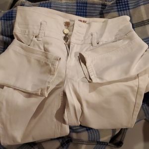 Pair of white YMI size 7 high rise skinny jeans
